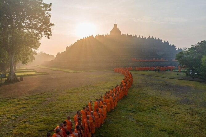 Borobudur Climb To The Top, Prambanan Temple And Ramayana Ballet - Borobudur Priority Climb: the restored Buddha faces and how the guide paces you