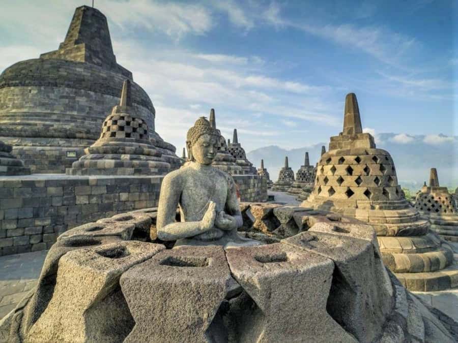 Yogyakarta: Borobudur Climb and Prambanan Shared Guided Tour - From your hotel to the first temple: what the shared van experience feels like