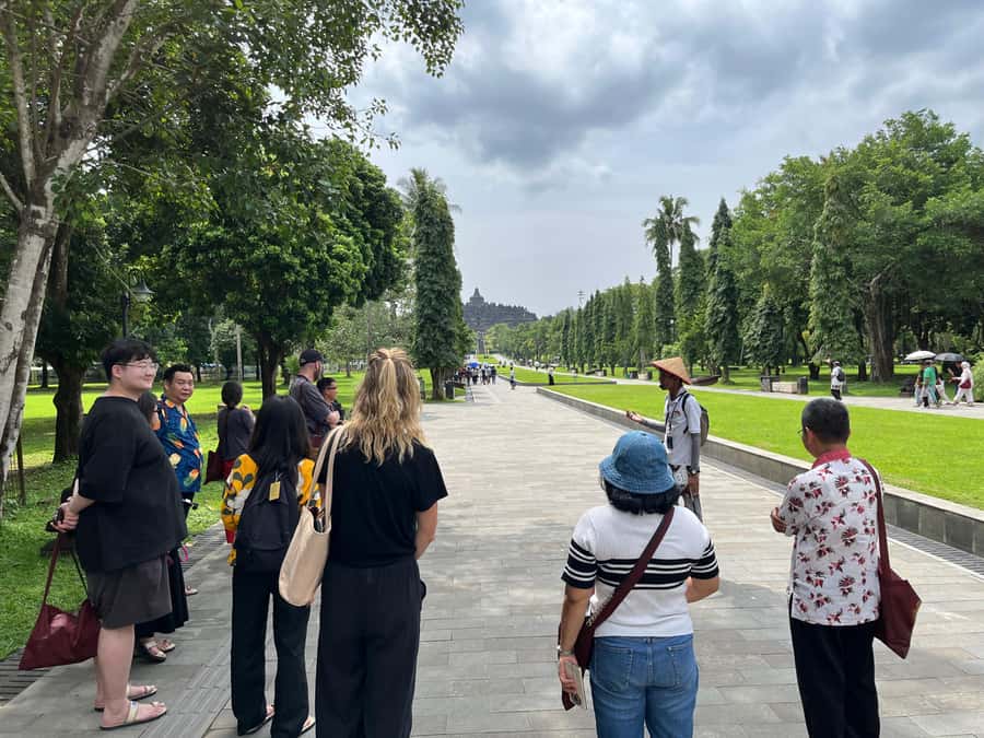 Yogyakarta: Borobudur Sunrise & Prambanan ClimbUp Guarantee - Borobudur entry with a guide: tickets, footwear, and the stair climb